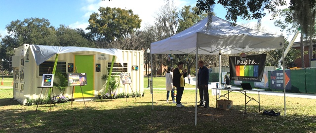 The Tiny Home made from a cargo container on display on the lawn beside the Reitz Union. Photo by Joshua Williamson
